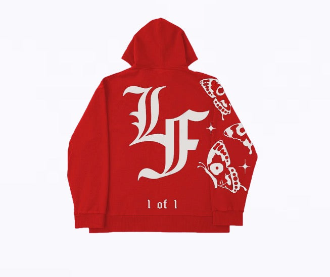 Close up image of the back of a red zip-up jacket with big "LF" and "1 of 1" in white Old English font and white animated butterflies