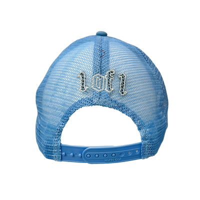 Close up image of the back of blue trucker hat with white font